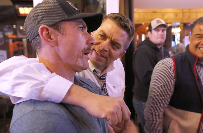 Mike Shorten, McHenry County Board District 4, talks with McHenry County Sheriff Robb Tadelman during a Republican election results watch party on Tuesday, Nov. 5, 2024, at Nikos Red Tavern in Woodstock.