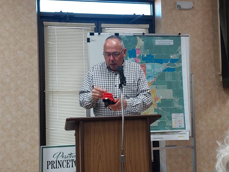 Princeton Ray Mabry shows the City Council the materials on Monday, April 15, 2024, for his One Bag Challenge.