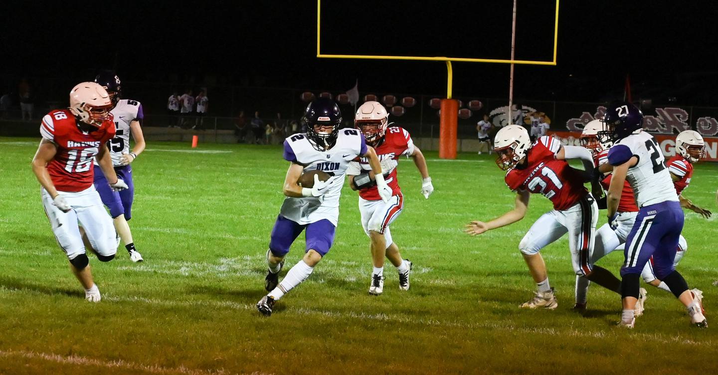 Dixon's Jath St. Pier finds an open seam to run through Oregon defenders Friday, Aug. 26, 2022.
