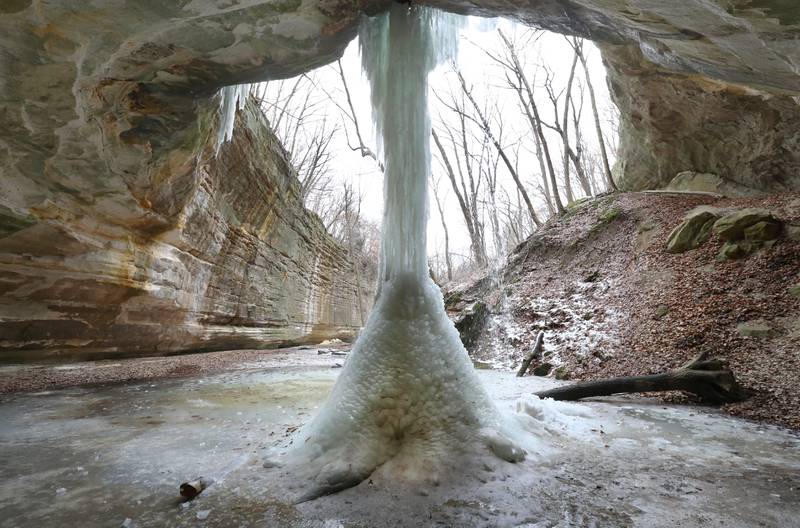 A frozen ice fall is fully intact in Ottawa Canyon on Tuesday, Feb. 7, 2023 at Starved Rock State Park.  Frozen waterfalls are common at Starved Rock and Matthiessen State Parks during the winter season. This year, the ice falls weren't as impressive due to the warmer than normal January. Only a handful of ice climbers were seen in the park this year unlike years past.