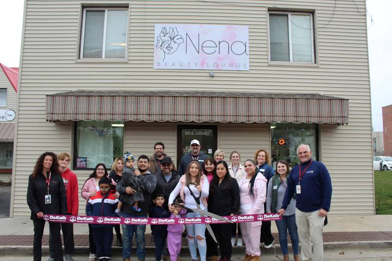 The DeKalb Chamber of Commerce celebrating Nena Beauty Lounge's opening