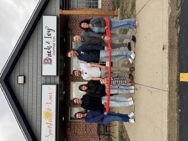 Logan and Camryn Deadmond, owners of Brick & Ivy Coffee Co. in Channahon cut the official ribbon to their new business with a Channahon Minooka Chamber/Grundy Chamber ribbon cutting. The Deadmonds were joined by Channahon officials, their family, staff, and Chamber representatives.