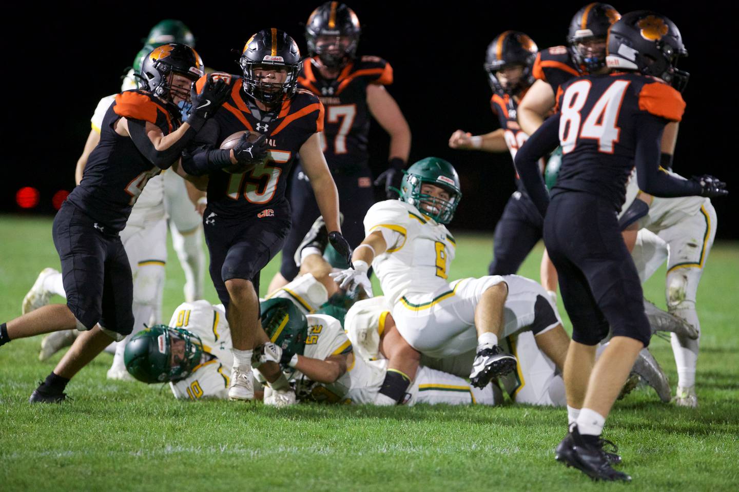 Crystal Lake Central's Cayden Parks runs past the defense of Crystal Lake South on Friday, Sept. 27,2024 in Crystal Lake.