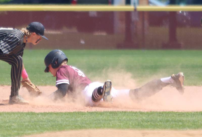 Marengo’s Maverick Shines slides safely into second base against Rockford Christian in IHSA Class 2A Regional Title Game action baseball at Richmond-Burton High School in Richmond  on Saturday, May 24, 2025.