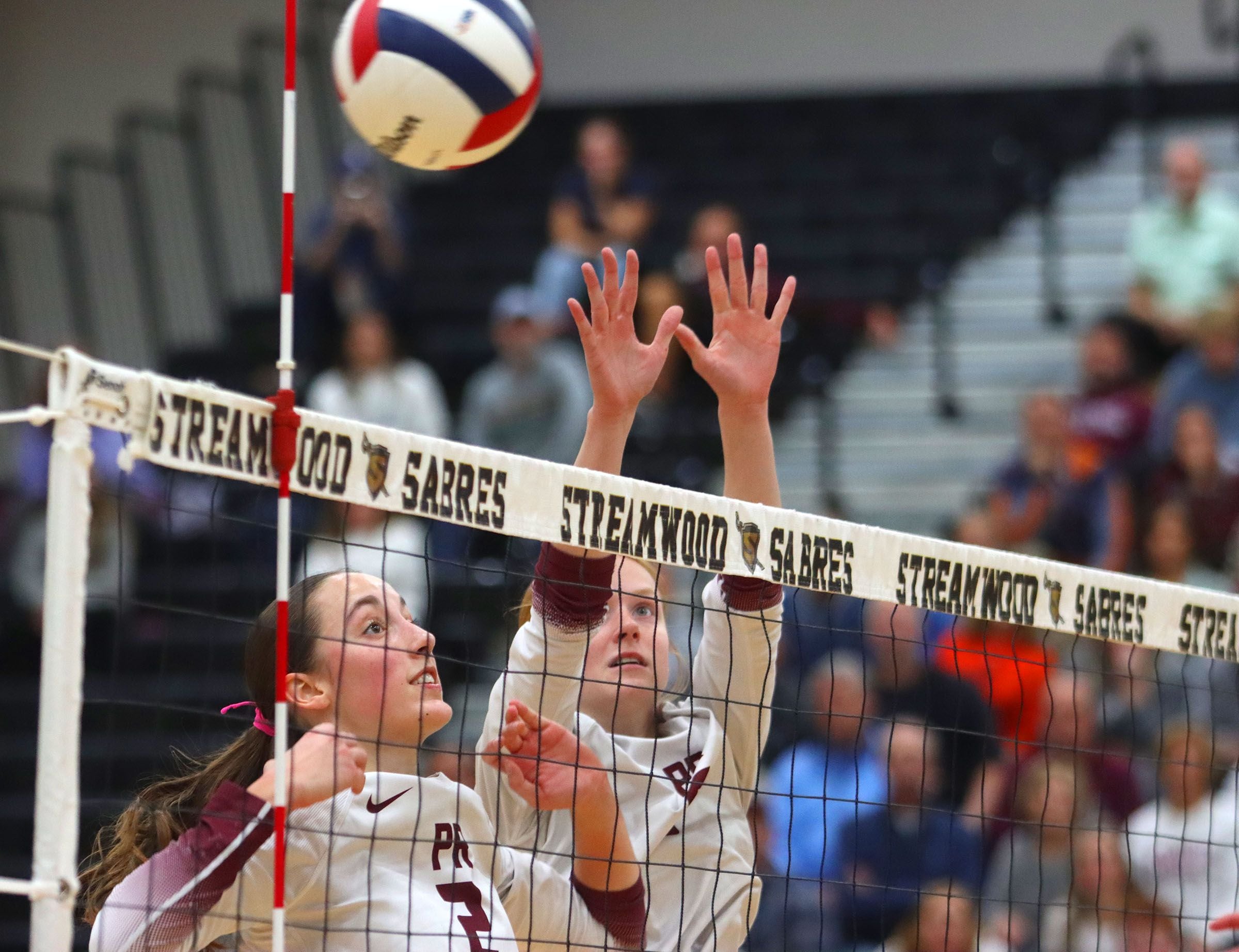 Prairie Ridge’s Addi Smith, left, and Sonora Bekere block against St. Viator in IHSA Class 3A Super-Sectional girls volleyball at Streamwood High School in Streamwood on Monday, November 10, 2025.