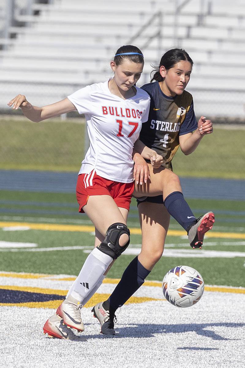 Sterling’s Kylie Todd and Streator’s Jordan Hatzer work for the ball Friday, May 15, 2026, during the Class 2A regional soccer quarterfinal.