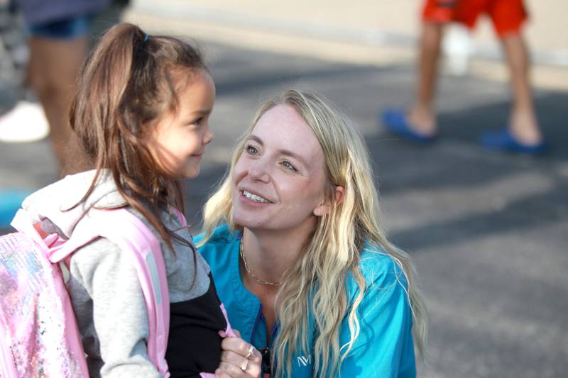 Claire Morton talks with her daughter, Brooklyn, on her first day of kindergarten Thursday, Aug. 22, 2024 at Harrison Street Elementary School in Geneva.