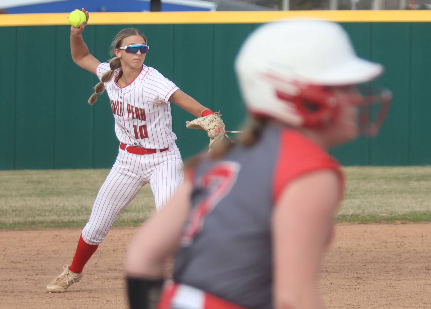 L-P's Kelsey Frederick throws out Morton's Autumn Dupage on Friday, March 20, 2026 at the L-P Athletic Complex in La Salle.