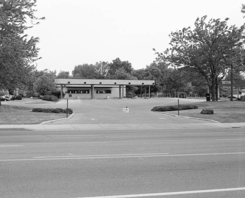 Looking south at Lincoln Highway at First National Bank's South Drive-Up, located across from the main bank at 141 West Lincoln Highway in DeKalb, just after the drive through moved across the street closer to the main bank, May 1992.