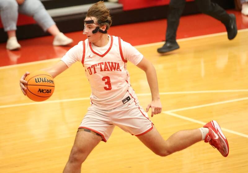 Ottawa's Connor Diederich saves the ball from going out of bounce against Plano during the Dean Riley Shootin' The Rock Thanksgiving Tournament on Tuesday, Nov. 26, 2024 in Kingman Gym at Ottawa High School.