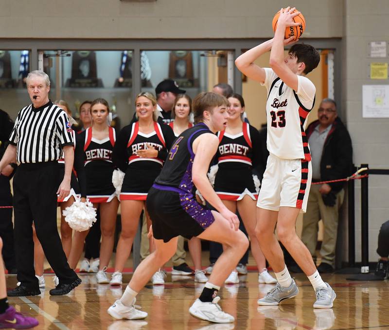 Benet’s Edvardas Stasys (23) shoots over Downers Grove North’s Jack Richtman during the Class 4A Benet Sectional championship game on March 7, 2025 at Benet Academy in Lisle.