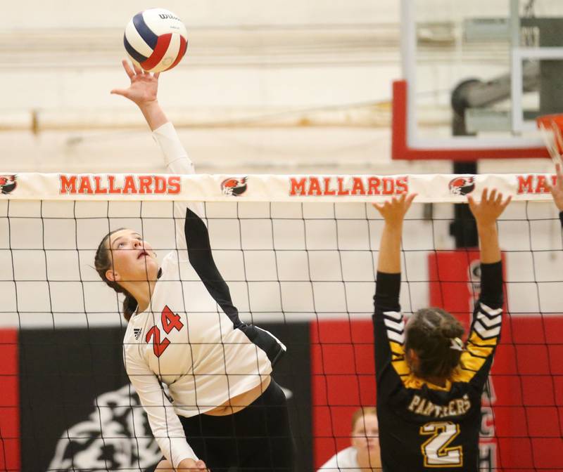 Henry-Senachwine's Harper Schrock sends a kill past Putnam County's Ella Pyszka on Thursday, Aug. 28, 2025 at Henry-Senachwine High School.