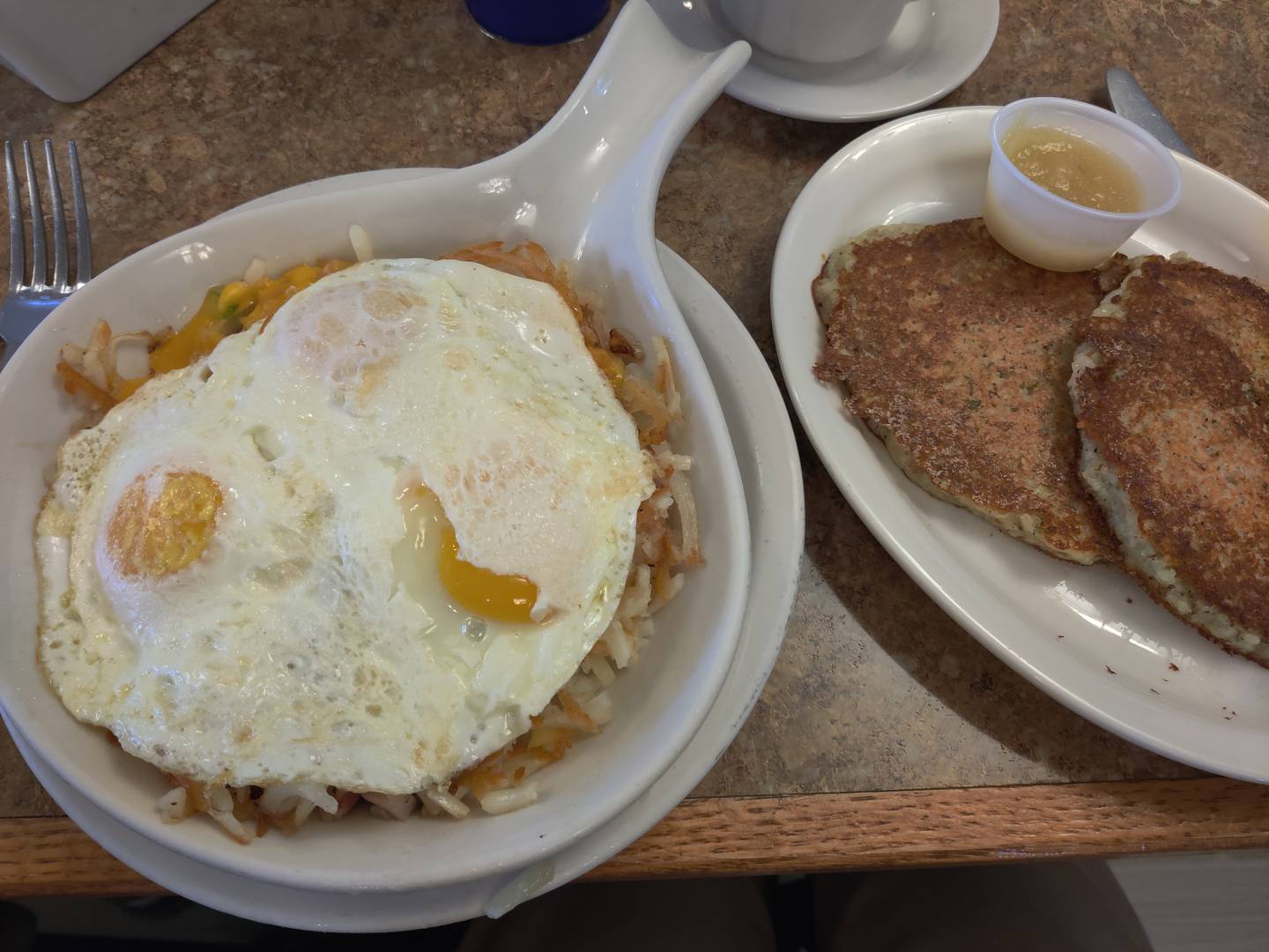 The Denver skillet with a side of potato pancakes at Briana's Pancake House Restaurant in Batavia.