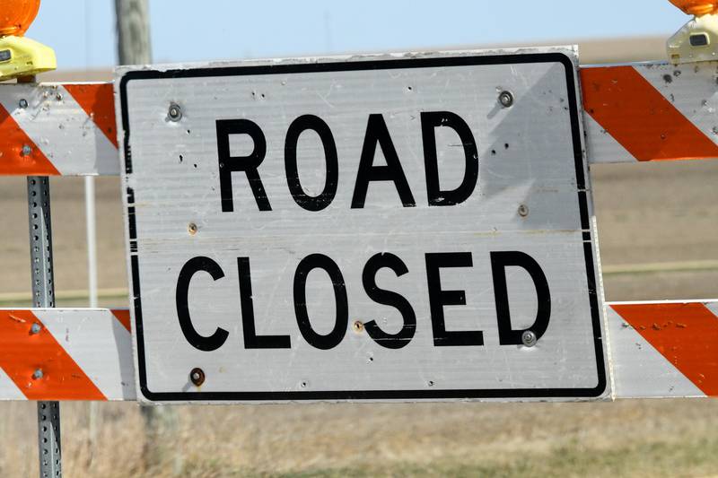 Road closed sign.