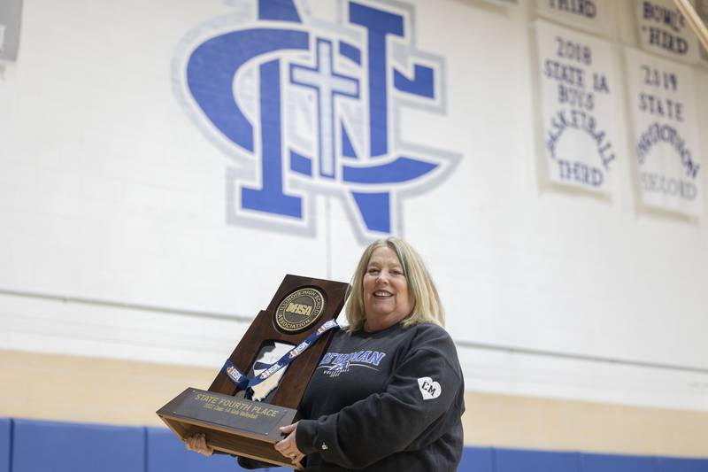 Newman’s Debbi Kelly led the Comets to a fourth place finish at the state volleyball tournament.