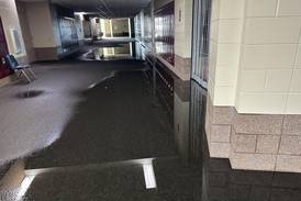 Oswego East High School will stay closed Tuesday after drain pipe malfunction during weekend storms