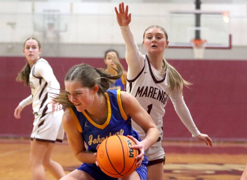 Johnsburg’s Summer Toussaint works under the net in varsity girls basketball on Tuesday, Jan. 6, 2026 at Homer “Bill” Barry Gymnasium on the campus of Marengo High School in Marengo.