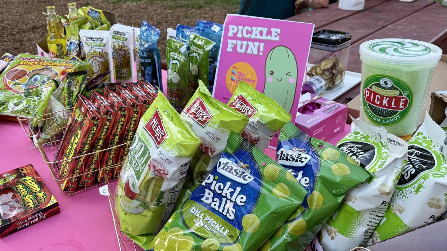 St. Charles candy store The Whimsey Farm was selling pickle flavored snacks of all kind at the Pickle Paradise festival in Pottowatomie Park on June 20, 2025.