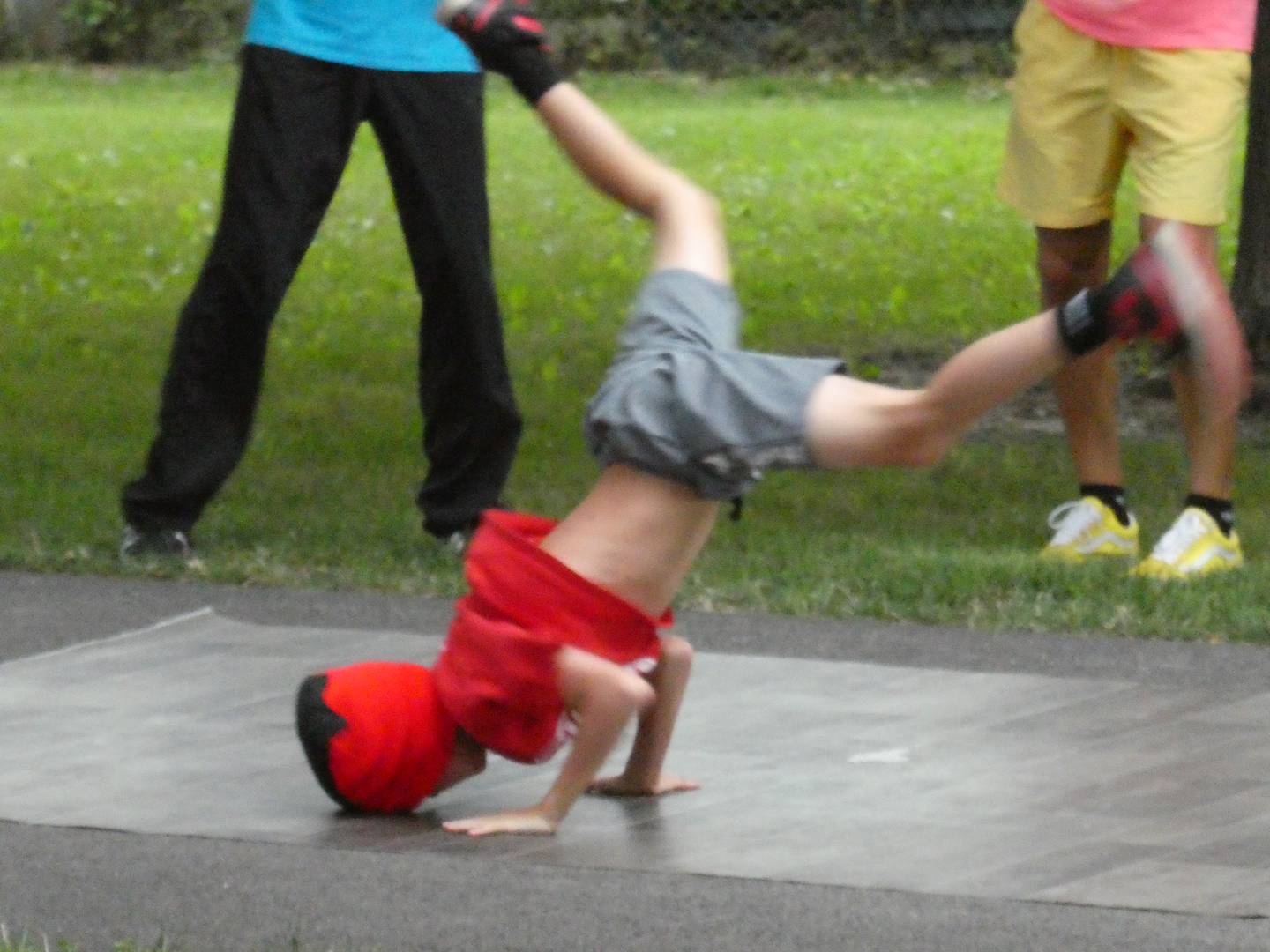 JR Moberg breakdances during a memorial service for Katriona Koziara, 13, on Friday, August 19, 2022 at Waverly Park in Rolling Meadows.