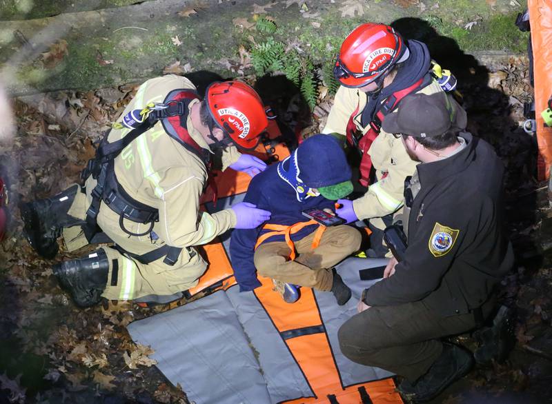 Firefighters tend to a patient who fell 20-30 feet on Tuesday, April 1, 2025 at Starved Rock State Park. A Mutual Aid Box Alarm System (MABAS) prompted rope and rescuers as far as Marseilles and Princeton.