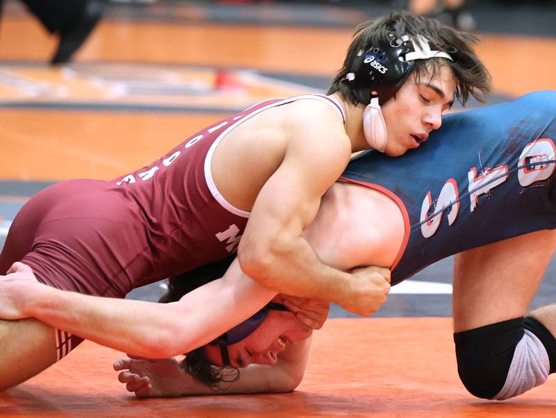 Moline’s Noah Tapia gets the upper hand on South Elgin’s Nico Clinite in a 152 pound match Wednesday, Nov. 23, 2022, during a quad at DeKalb High School.