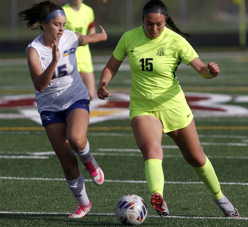 Richmond-Burton's Brianna Maldonado (right) controls the ball against Johnsburg's Lauren McQuiston Kishwaukee River Conference Girls Soccer Tournament Championship Match on Wednesday, May 1, 2024, at Richmond-Burton High School.
