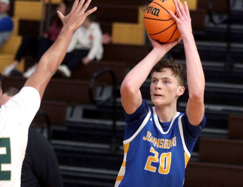 Johnsburg’s Josh Kaunas shoots a three-point basket against Boylan in varsity boys basketball Hinkle Holiday Classic action on Tuesday, Dec. 23, 2025, at Jacobs High School in Algonquin.