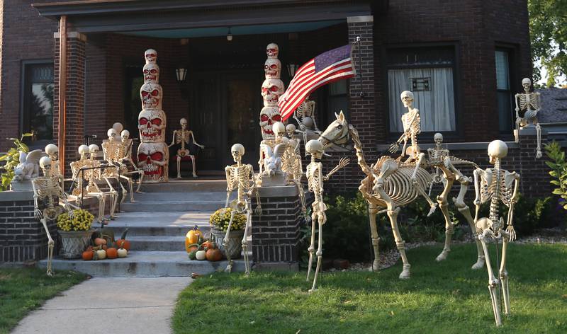 Many skeletons cover the lawn at this home in the 1300 block of Ottawa Avenue on Thursday, Oct. 12, 2023 in Ottawa.