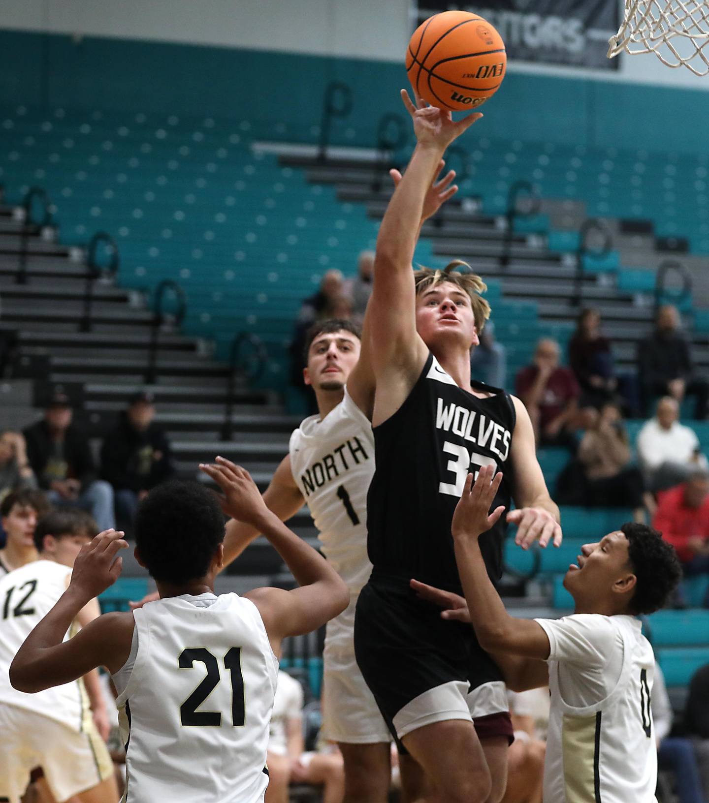 Prairie Ridge's Maddon McKim drives to the basket against the Grayslake North defense during the 2025 Hoops for Healing tournament basketball game on Wednesday, Nov. 26, 2025, at Woodstock North High School.