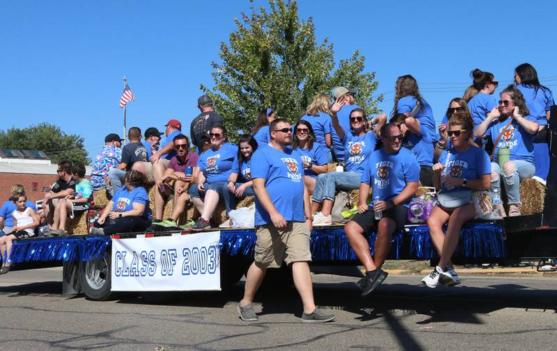 The Princeton High School class of 2003 rides on a float during the 52nd annual Homestead Festival parade on Saturday, Sept. 9, 2023 in Princeton.