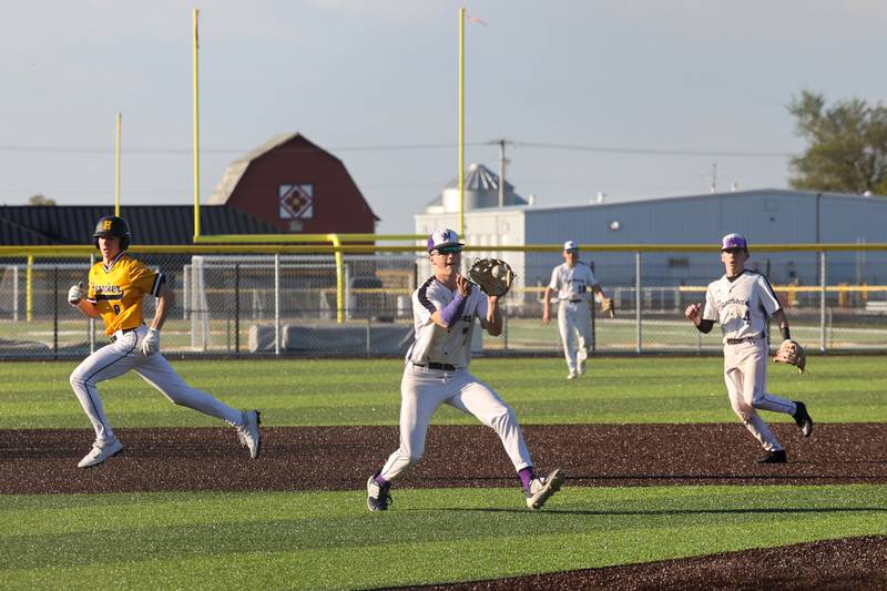 Manteno’s Quinn Borden fields a ball Herscher's Payten Young  advances to third during the Panthers’ 8-7 victory over Herscher on Tuesday, May 6, 2025.