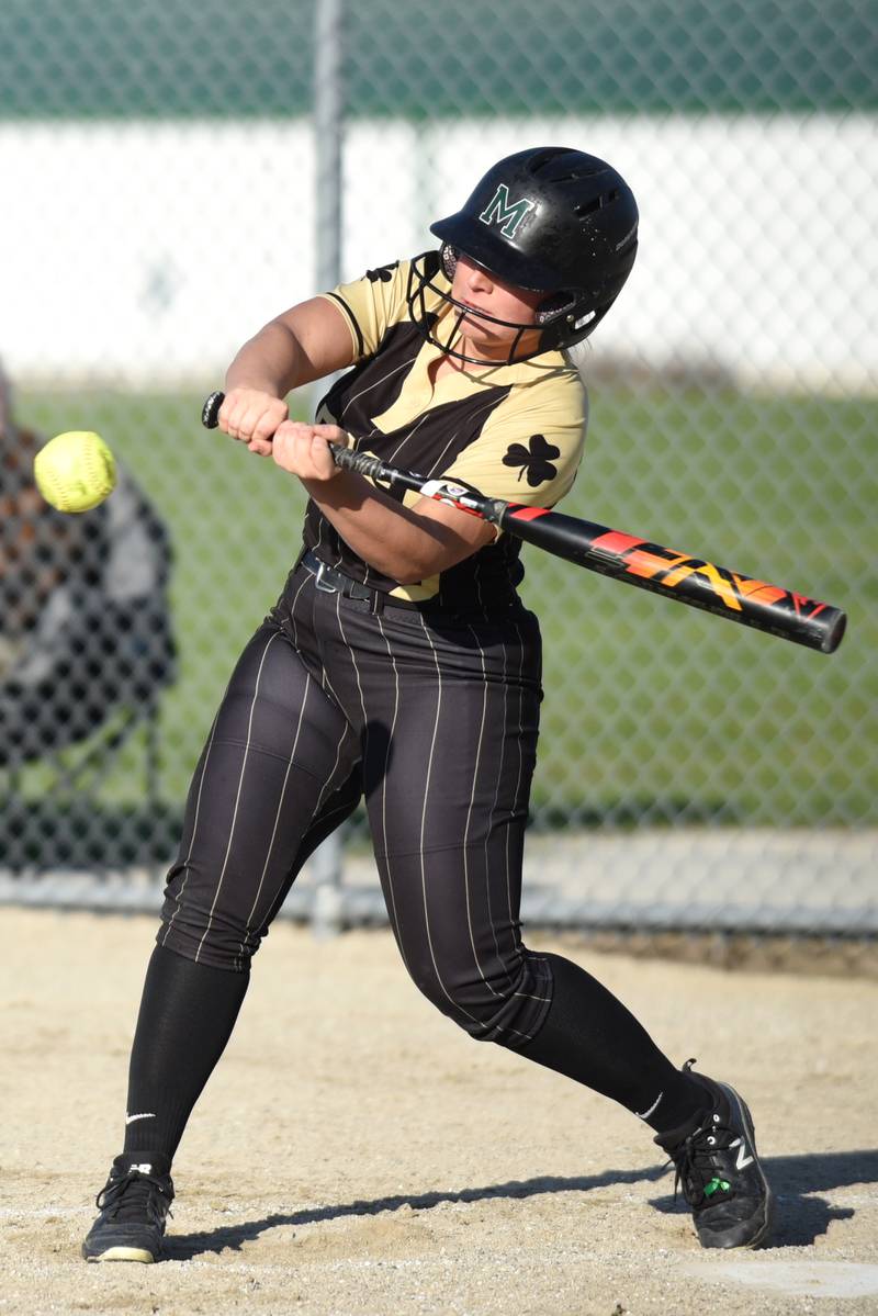 Bishop McNamara's Bella DeLuca swings at a pitch during a home game against Aurora Christian Tuesday, April 8, 2025.