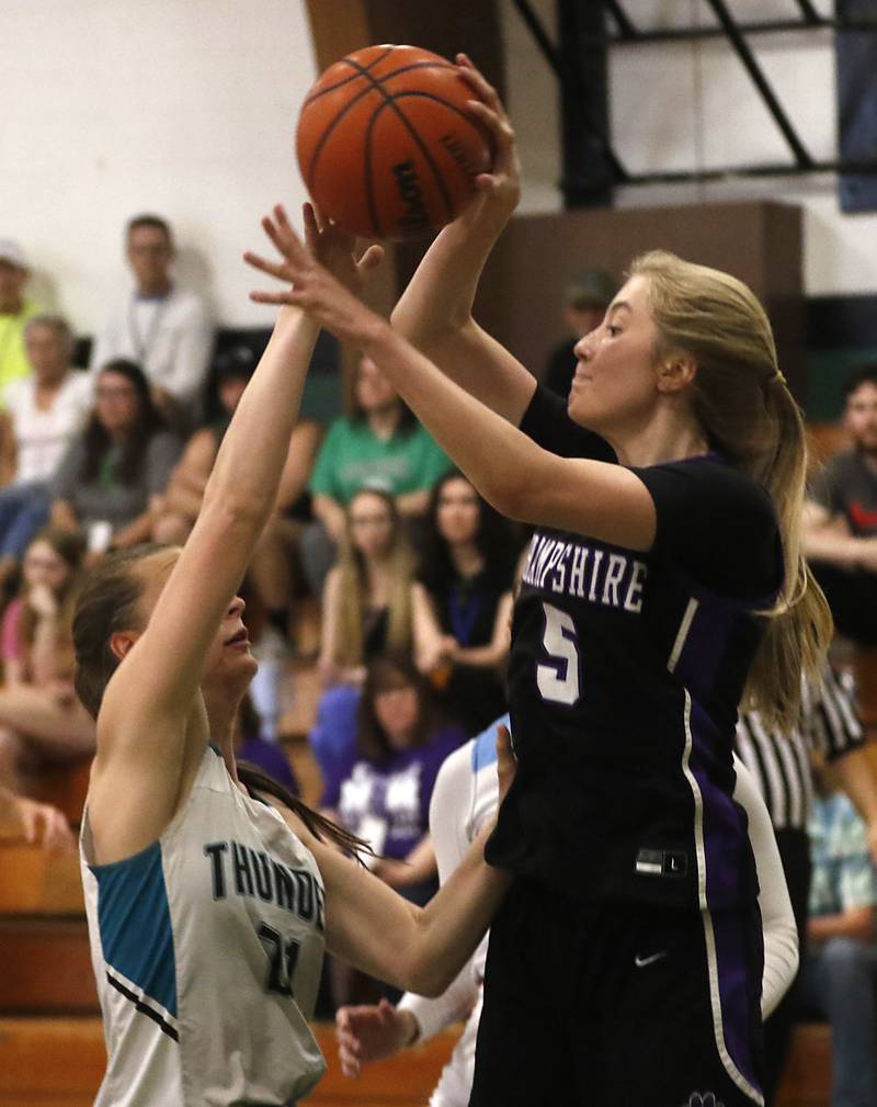 Hampshire's Whitney Thompson passes out of the double team of Alden-Hebron’s Evelyn Heber and Huntley's Yasmine Morsy during the girl’s game of McHenry County Area All-Star Basketball Extravaganza on Sunday, April 14, 2024, at Alden-Hebron’s Tigard Gymnasium in Hebron.