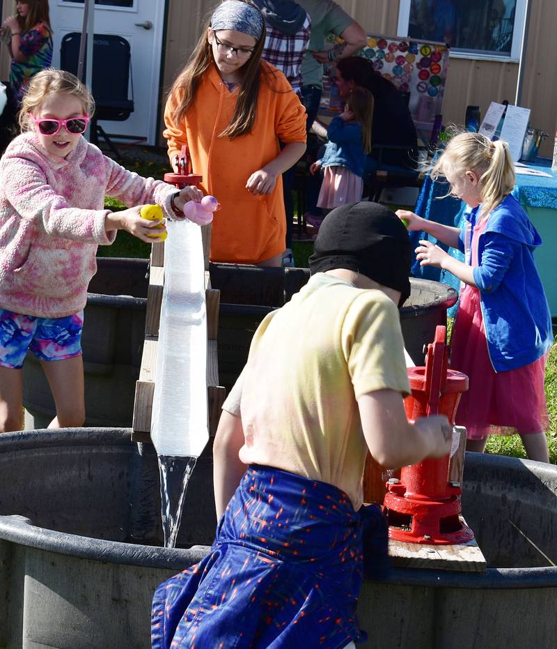 Kids work the pumps Saturday, May 10, 2025, at P&C Little Rascals’ open house to race their ducks.