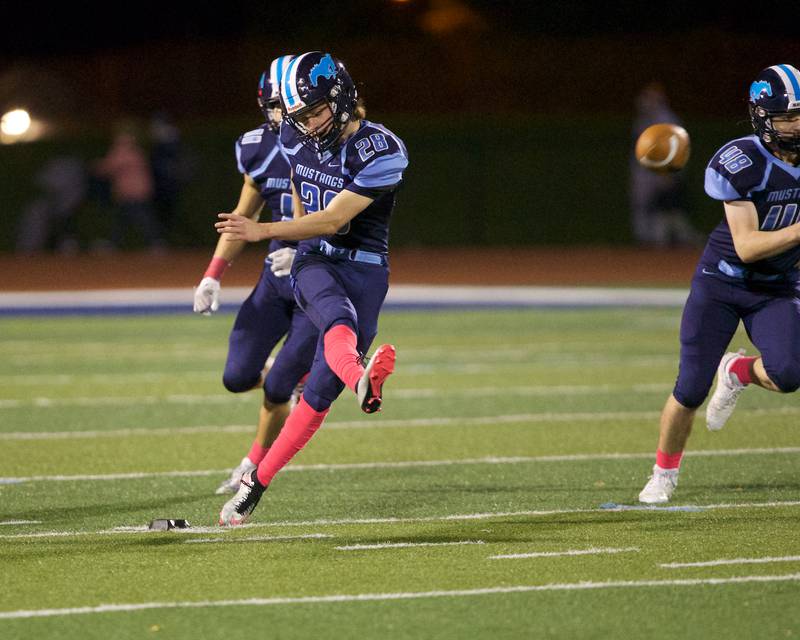 Downer's Grove South's Nathan Austin with the kick off against Addison Trail on Friday, Oct.20,2023 in Downers Grove.