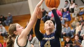 Photos: Marquette falls to Midland in girls basketball