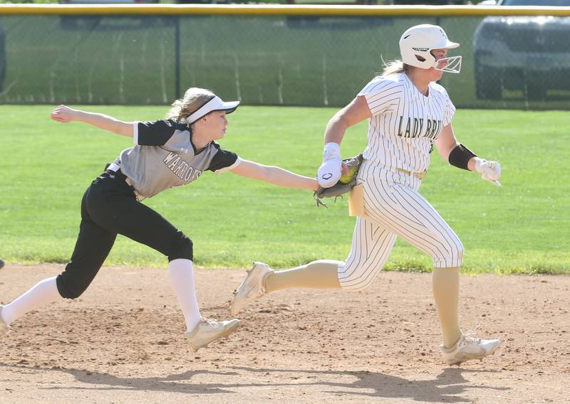 Woodland/Flanagan-Cornell's Olivia Chrismarick tags out St. Bede's Reagan Stoudt while running back to second base on Monday, April 29, 2024 at St. Bede Academy.