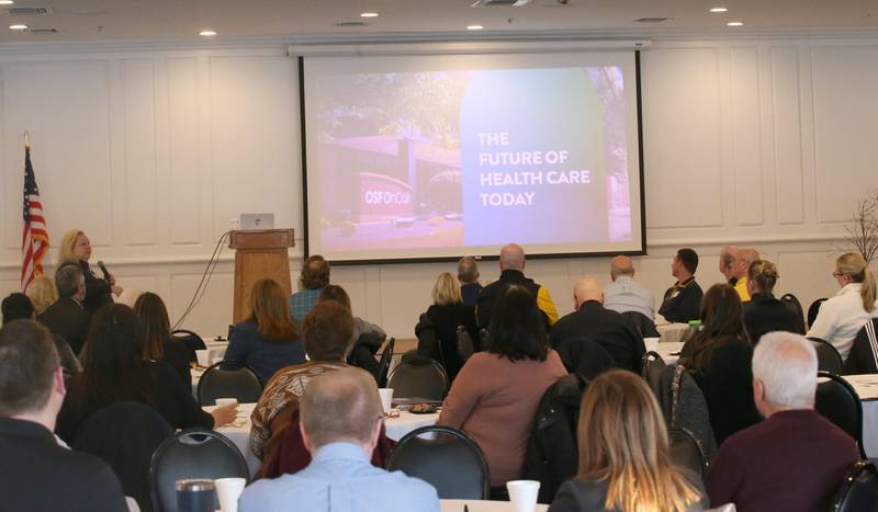 Nearly 100 public leaders and other dignitaries gather during the OSF Community Breakfast Regional Update on Tuesday, Nov. 28, 2023, at Senica's Oak Ridge in La Salle.