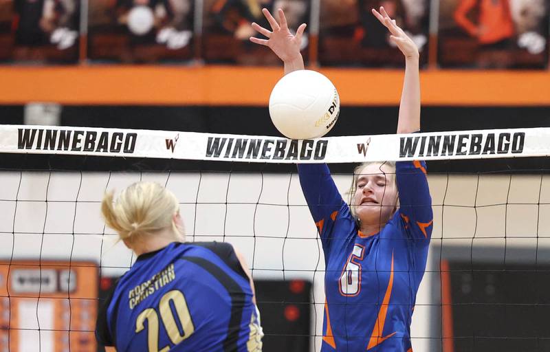 Genoa-Kingston's Kaitlin Rahn blocks Rockford Christian's Elle Jones during their Class 2A sectional semifinal match Monday, Oct. 31, 2022, at Winnebago High School.
