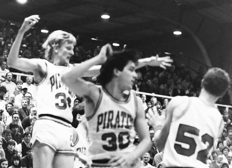 Ottawa's Dave Yell, Dewey Gould ,and Mike Sipula look for a rebound during the Regional title game on Saturday, Feb. 28, 1986 at La Salle-Peru Township High School.