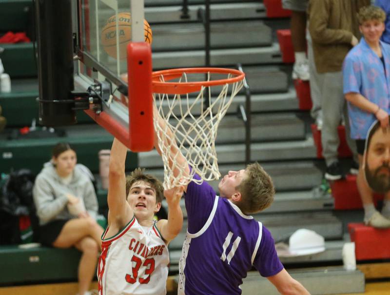 L-P's Gavin Stokes lets go of a shot over Rochelle's Brody Bruns on Friday, Feb. 13, 2026 in Sellett Gymnasium at L-P High School.