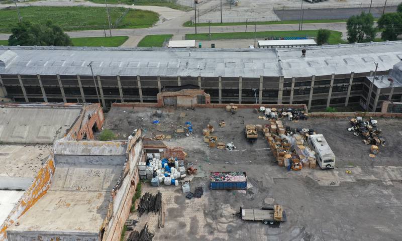 An aerial view of the storage area behined the historic Westclox building on Monday, July 17, 2023 in Peru. The building caught fire last Friday when an unattended fire behind the the building  was the cause of the larger fire in the building.