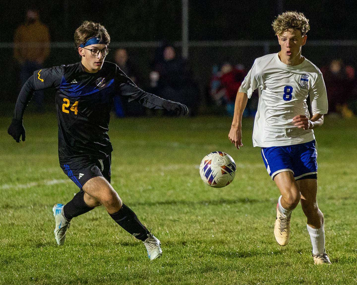 Nolan Kerley (24) of Somonauk/Leland/Newark and Lofton Adkins (8) of Hinckley-Big Rock pursue ball during the Little Ten Conference Championship match on Thursday, Oct. 9, 2025 at Hinckley-Big Rock School in Hinckley.