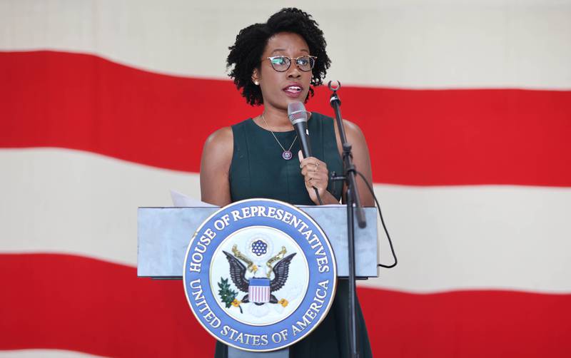 U.S. Rep. Lauren Underwood, D-Naperville, speaks Tuesday, Aug. 23, 2022, during a town hall meeting in one of the hangers at the DeKalb Taylor Municipal Airport.