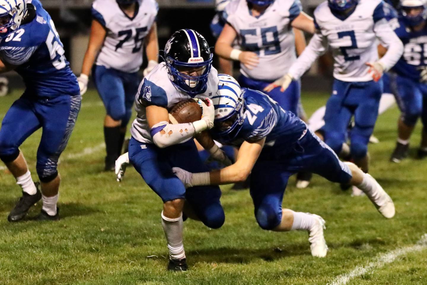 Princeton's Danny Cihocki brings down a Peotone Blue Devil Friday night at Bryant Field. The Tigers won 56-28.