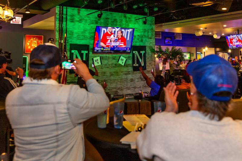 Patrons watch the NFL Draft at Max in McCook.  April 25, 2024.