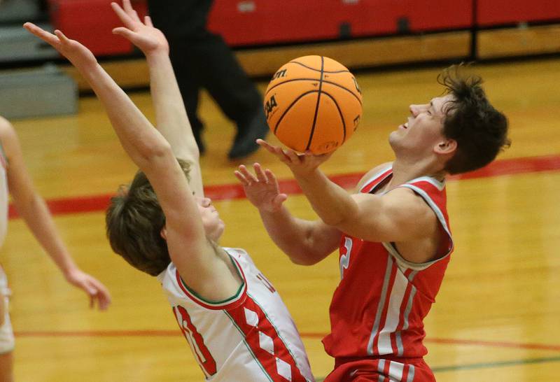 Streator's Matt Williamson is fouled in the lane by L-P's Braylin Bond on Tuesday, Jan. 14, 2025 in Sellett Gymnasium at L-P High School.