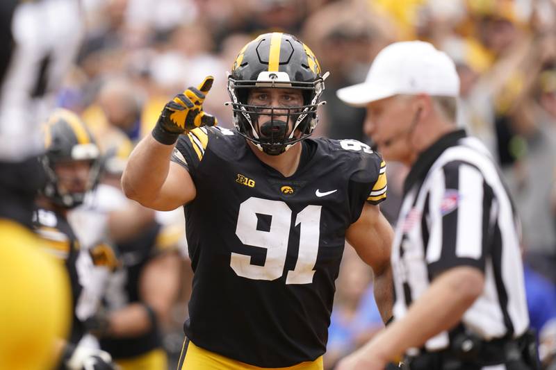 Iowa defensive lineman Lukas Van Ness, who played high school football at Barrington, reacts after making a tackle against South Dakota State, Saturday, Sept. 3, 2022, in Iowa City, Iowa.