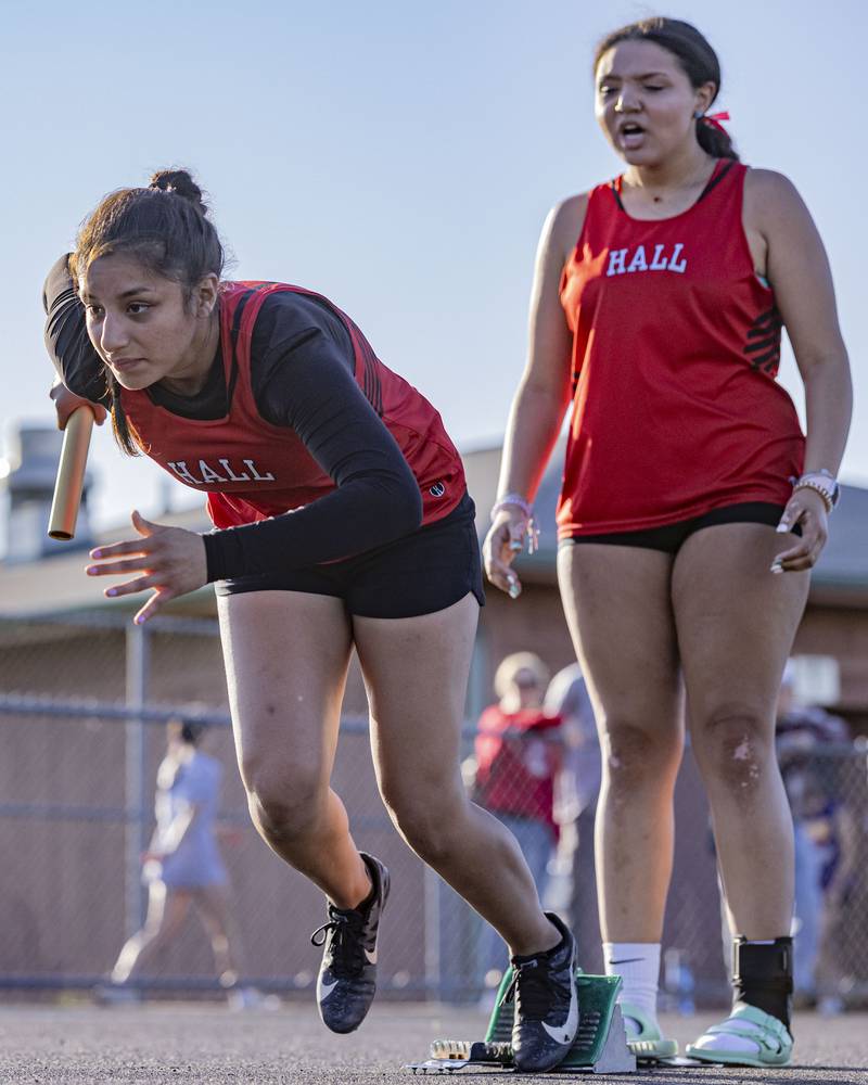 Hall High School's Natalie Zamora pushes off of the starting block during the 4x100 heat during the meet at Mendota High School on May 3, 2024.