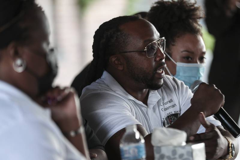 Joliet Black Lives Matter activist Karl Ferrell asks questions about police accountability on Wednesday, Sept. 8, 2021, at Joliet Area Historical Museum in Joliet, Ill. State Attorney General Kwame Raoul and his team held a small meeting with community members after his announcement of a civil investigation into the Joliet Police Department.